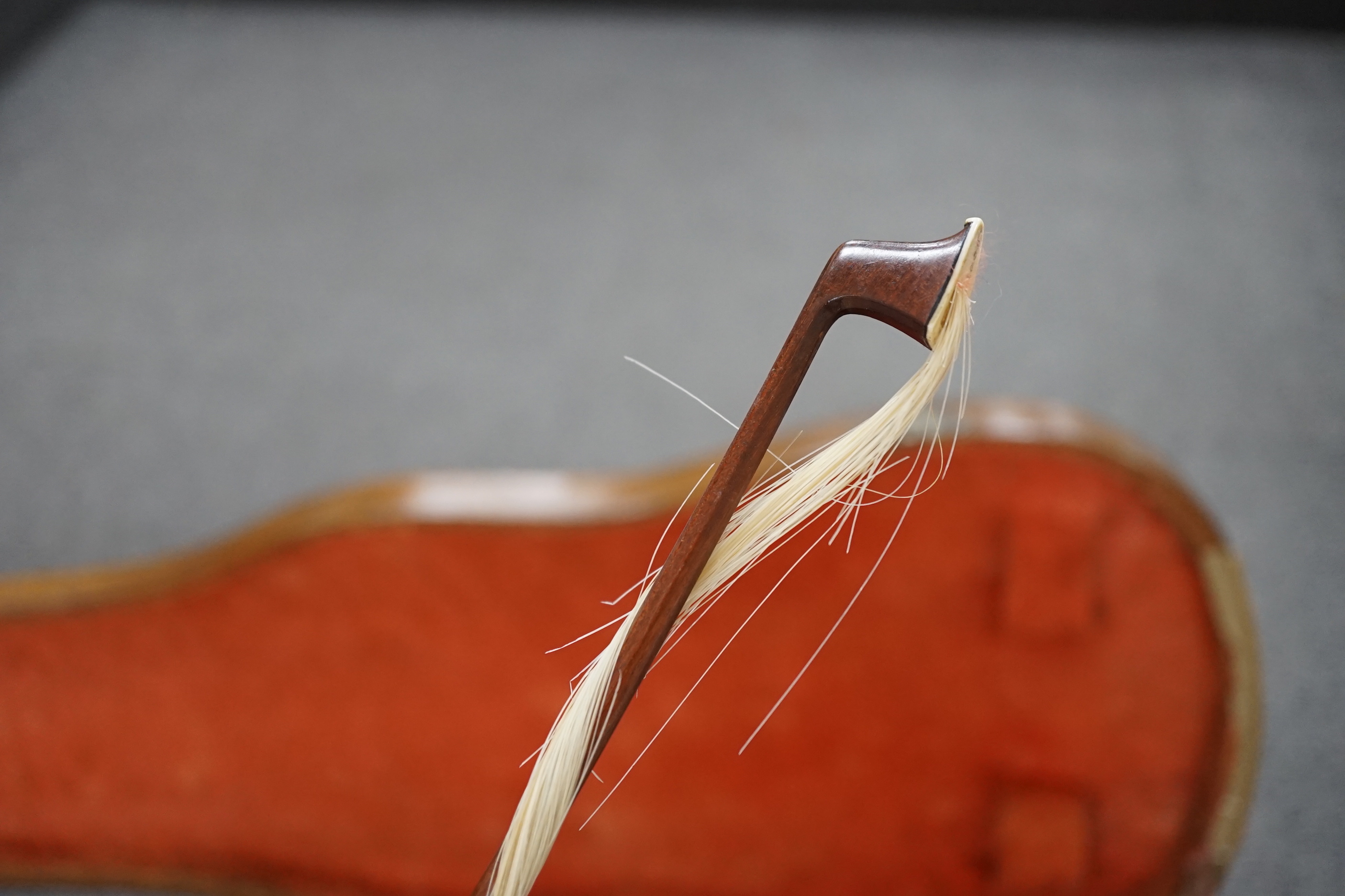 A 19th century violin with silver mounted bow and case, back measures 36cm CITES Submission reference JX7RJU7S